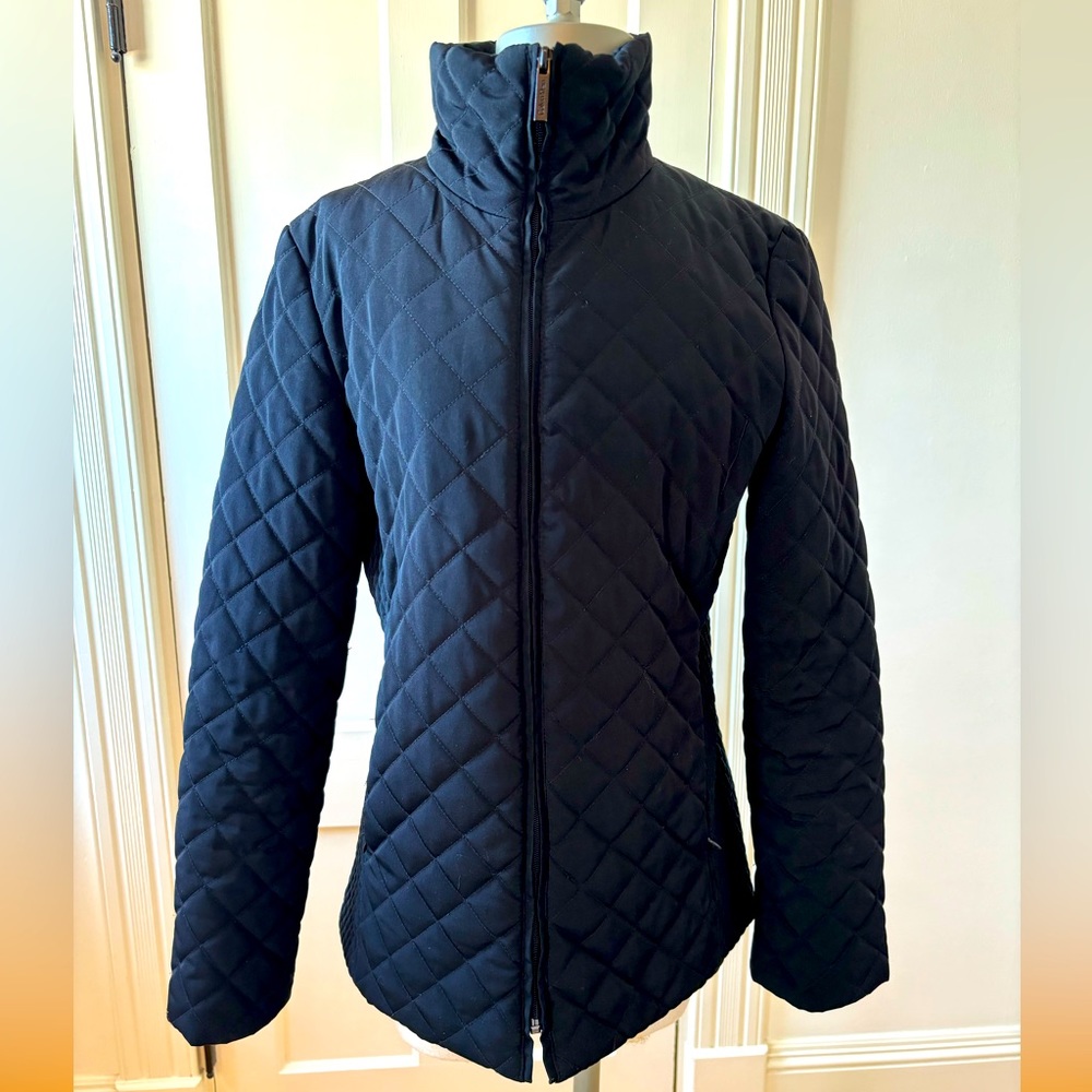 Calvin Klein black quilted winter jacket. Classy and smart.